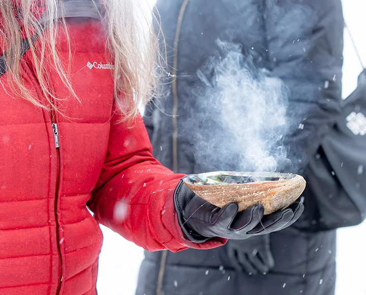 image of woman smudging
