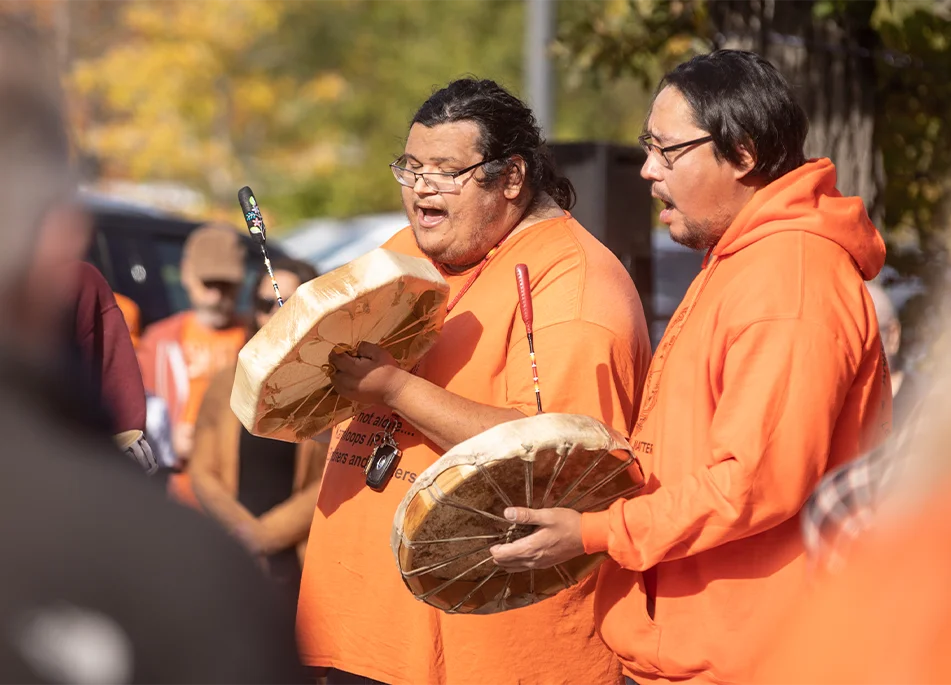 image of men playing drums